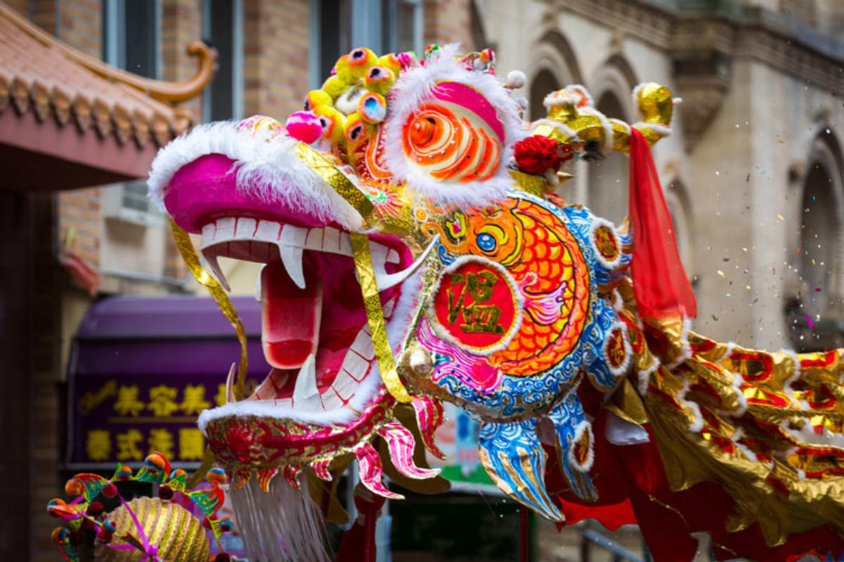 Colorful lion float in Chinese parade.