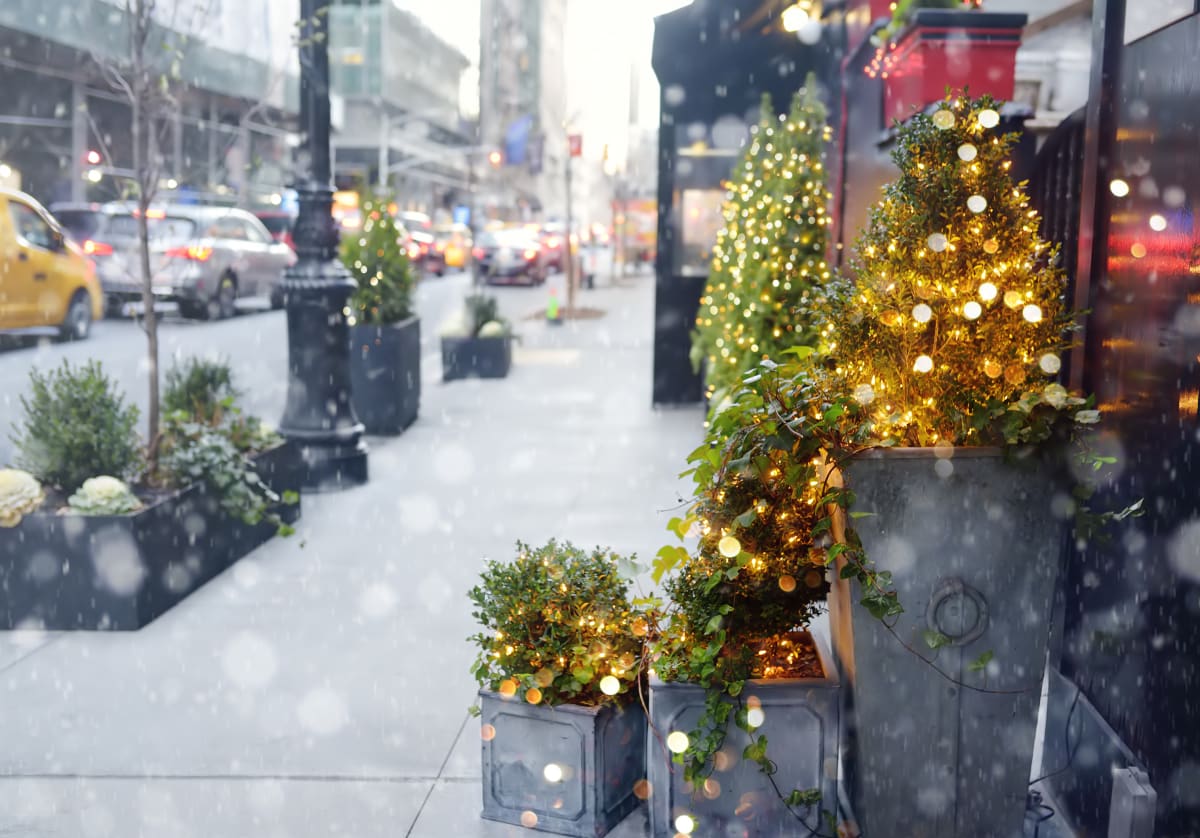 New York City Street with festive decorations in the snow