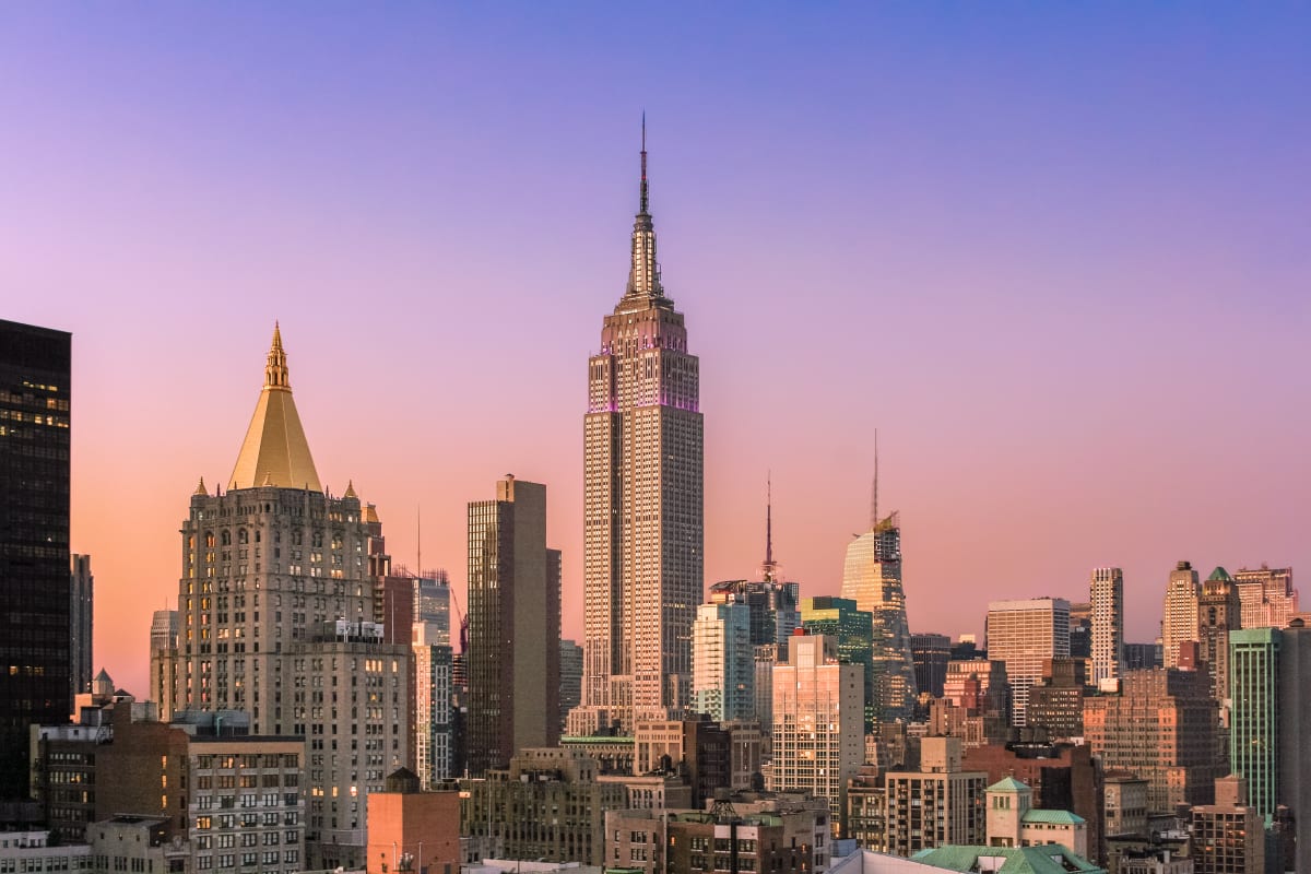 NYC skyline at sunset with empire state building in the middle