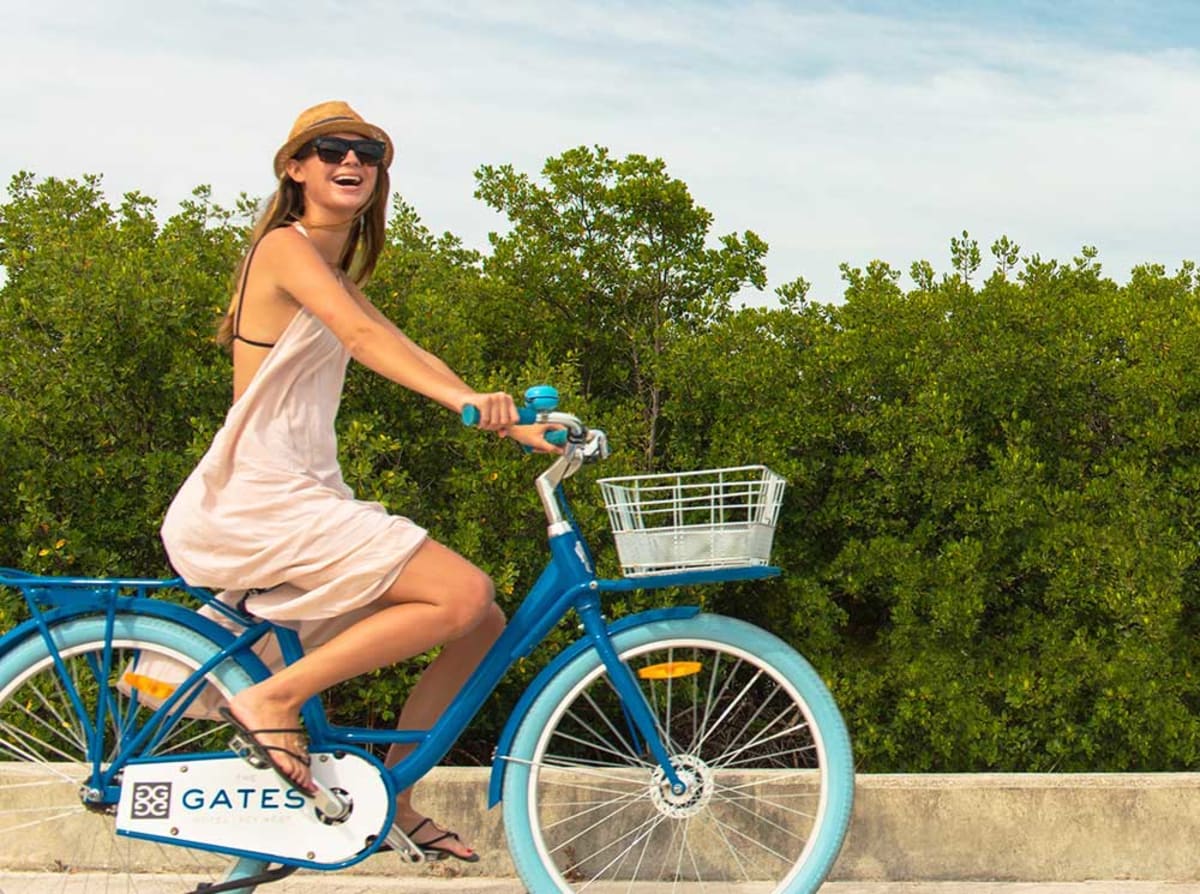 lady-on-gates-bicycle