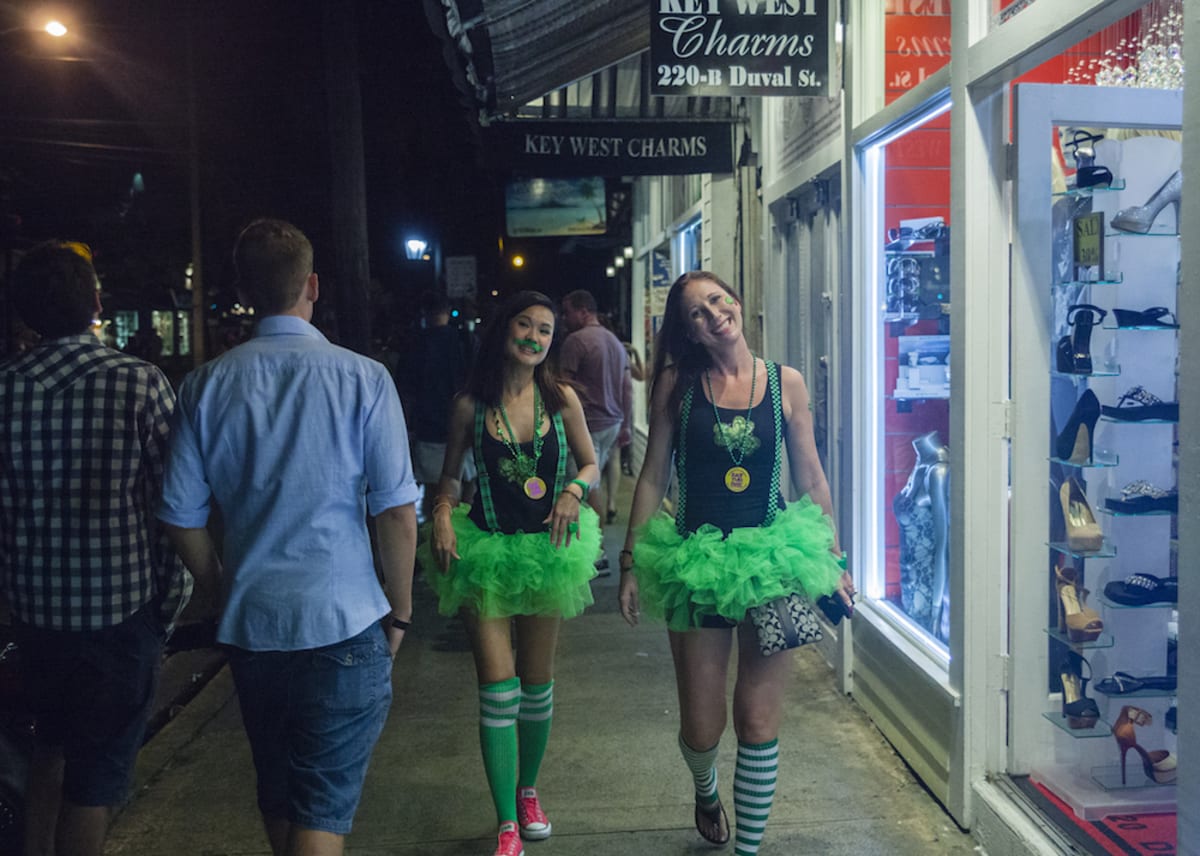 friends-dressed-in-tutus-walk-in-key-west