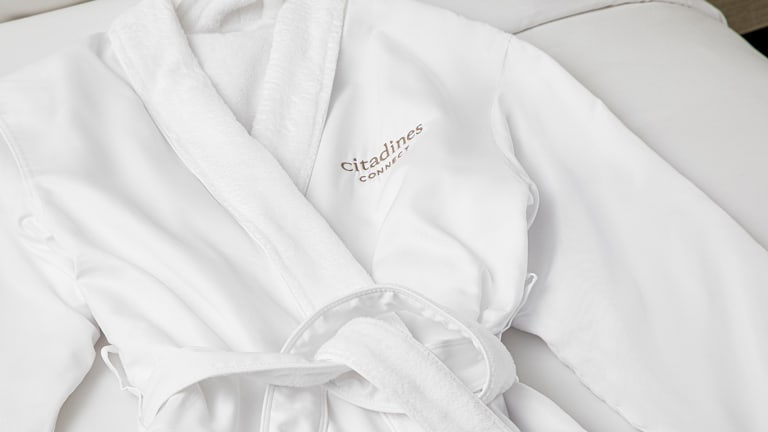 Robe with hotel logo