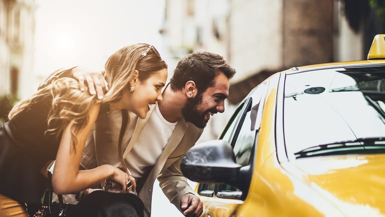 couple-taking-a-cab