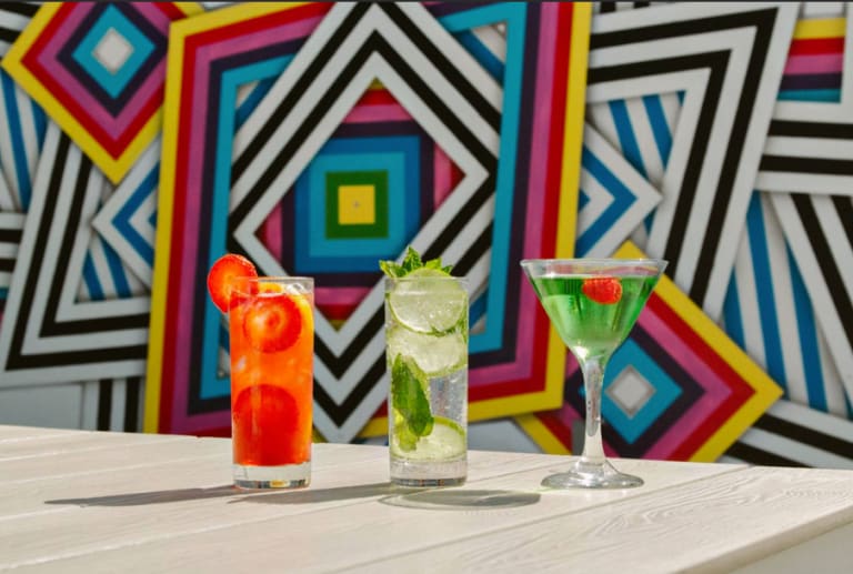 cocktails-in-front-of-art-wall-sagamore