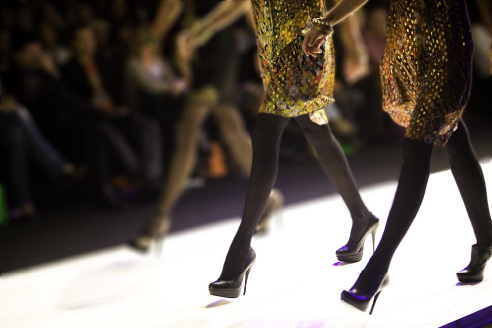 models-walk-down-runway-during-nyfw