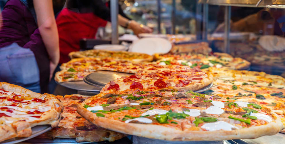 pizzas-on-display-on-restaurant-counter