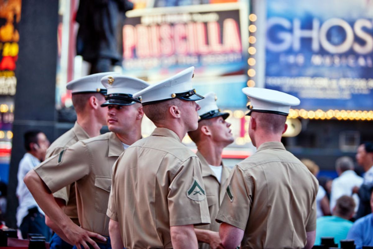 group-of-sailors-standing-in-times-square