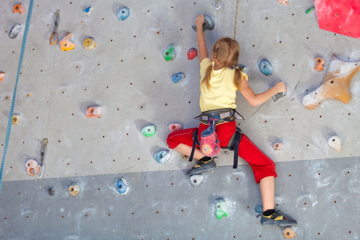 little-girl-climbing-indoor-wall