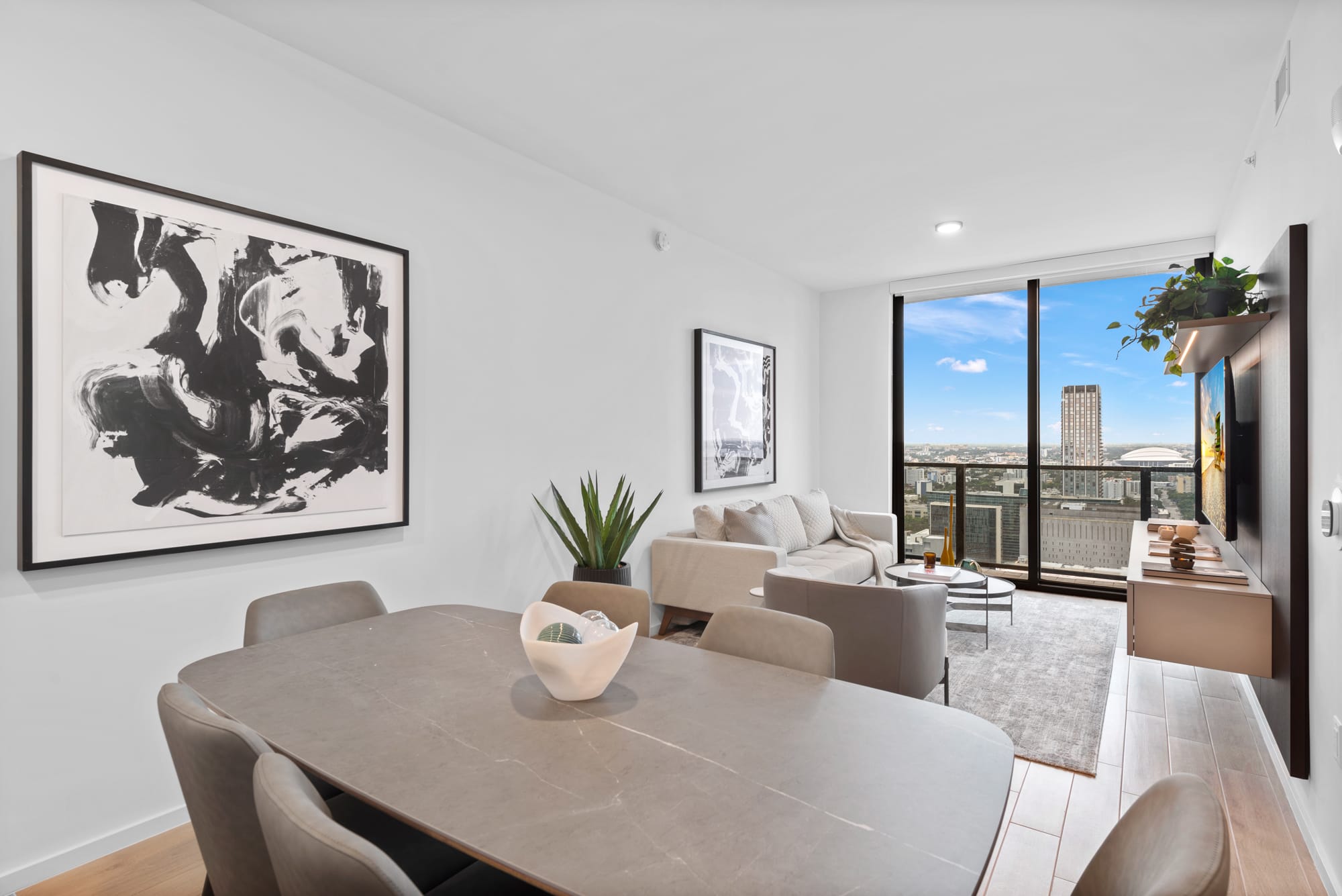 City View One Bedroom Suite dining and living area at The Elser Hotel Miami with Downtown views and modern furnishings