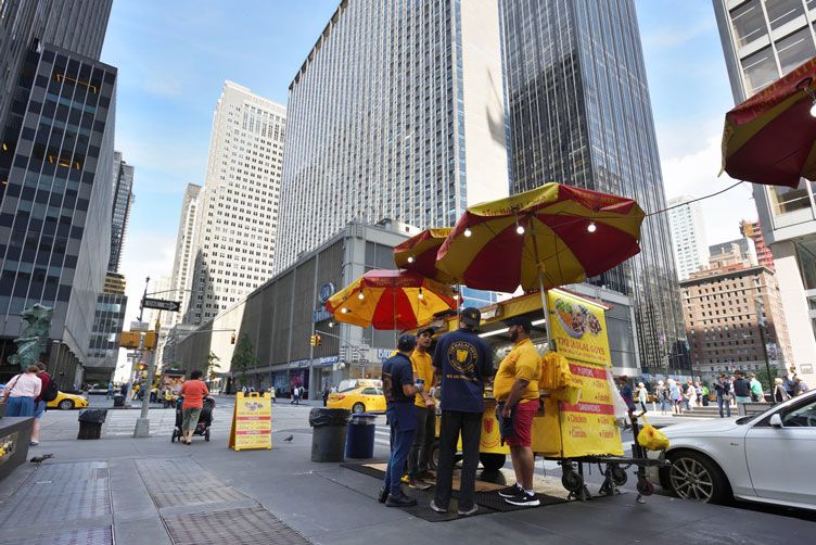 NYC street food: beef, onions, peppers, cheese on roll, Mr. Purple