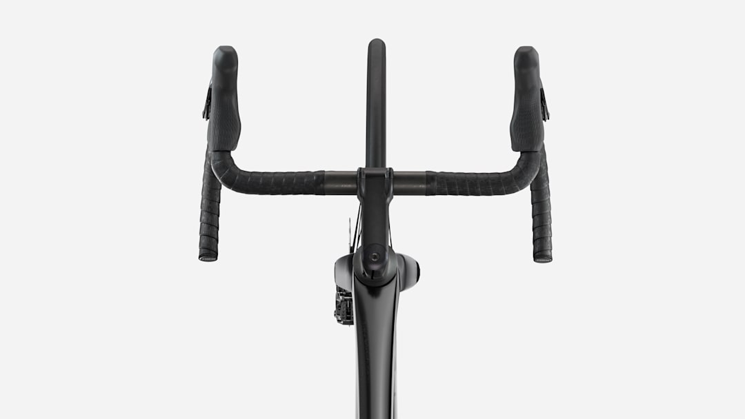 trek bicycle handlebars MTB to fit Mountain Bike By pairing integrated elastomer handlebar inserts with advanced ergonomic grips 2025 Trek Aero RSL Road