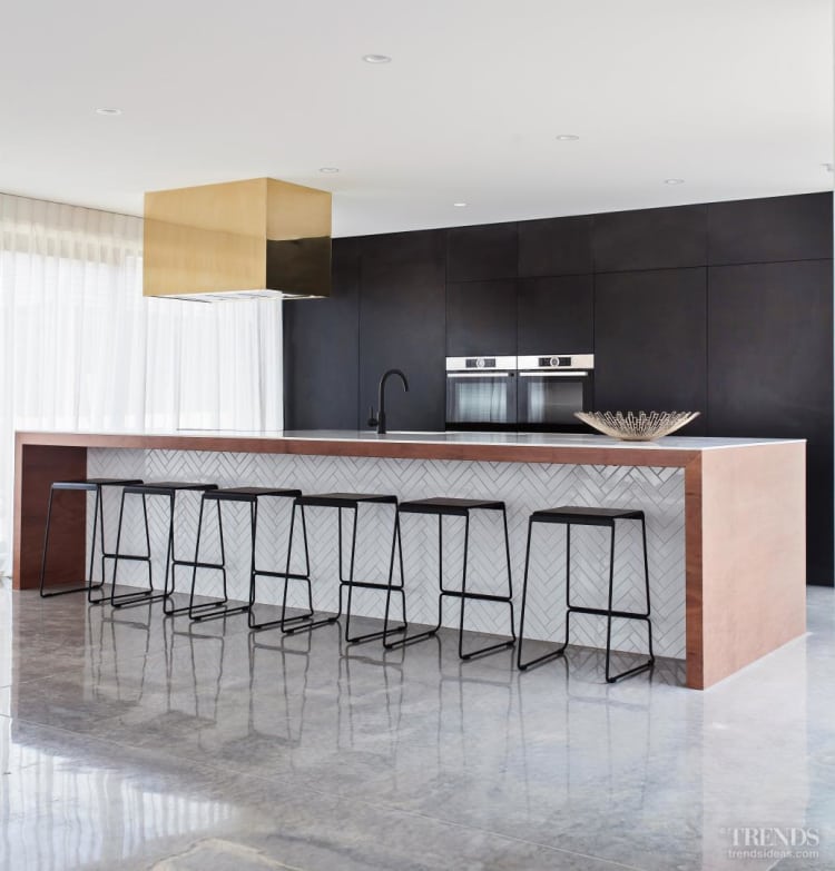 Minimalist Family Kitchen With Black Wall Cabinetry And Wood Framed Island