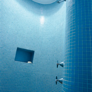 The detail of a blue tiled shower stall aqua, azure, blue, light, water, teal, blue