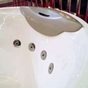 A detail of spouts in a spa bath bathroom sink, bathtub, ceramic, plumbing fixture, product design, sink, tap, toilet seat, white