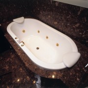 The detail of a bath tub of a bathroom sink, bathtub, bidet, ceramic, plumbing fixture, sink, toilet seat, black, white