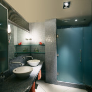 The view of a bathroom featuring twin basins architecture, bathroom, ceiling, interior design, public toilet, room, toilet, black