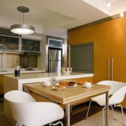 View of the kitchen with slide-out table, polished ceiling, countertop, dining room, interior design, kitchen, real estate, brown