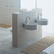 Bathroom: two round basins cantilevered out from a bathroom, bathroom sink, bidet, ceramic, floor, plumbing fixture, product design, tap, gray, white