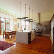 The view of a renovated kitchen - The ceiling, countertop, floor, flooring, hardwood, home, interior design, kitchen, laminate flooring, living room, property, real estate, room, wall, wood, wood flooring, brown, gray