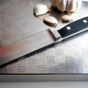 An example of the different textured stainless steel knife, product design, wood, gray, white