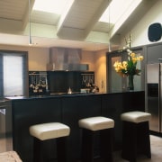 The view of a kitchen with a central countertop, interior design, kitchen, real estate, black