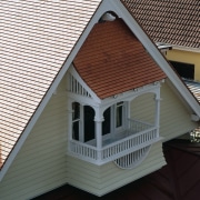 Terracotta roof shingles on steep roof, and on architecture, building, daylighting, facade, home, house, real estate, residential area, roof, siding, window, wood, black, gray