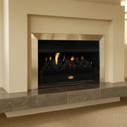 Indoor fireplace with cream and aluminium surround, and fireplace, hearth, heat, wood burning stove, orange, brown