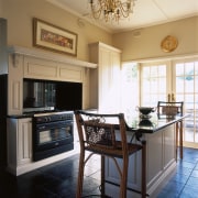 English Provincial style kitchen with cream walls and cabinetry, ceiling, countertop, cuisine classique, home, interior design, kitchen, living room, real estate, room, window, black