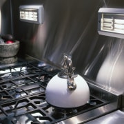 The detail of the cooking area in an interior design, black, gray