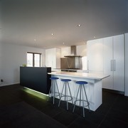 Kitchen with white cabinetry, floor to ceiling storage, architecture, ceiling, countertop, daylighting, floor, house, interior design, kitchen, product design, real estate, room, table, gray, black