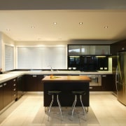 Kitchen with dark brown cabinetry, white benchtops, timber architecture, cabinetry, countertop, cuisine classique, floor, house, interior design, kitchen, real estate, room, orange