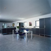 Kitchen with dark grey cabinetry and aluminium trim, architecture, ceiling, daylighting, floor, flooring, house, interior design, real estate, table, gray