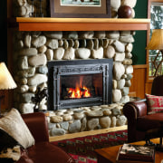 View of the stone fireplace from Travis Industries fireplace, hearth, home, interior design, living room, wood burning stove, brown