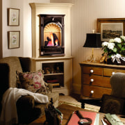 View of the fireplace within this home - furniture, home, interior design, living room, room, brown, orange, black