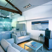 An informal meeting area in the offices of blue, ceiling, home, interior design, living room, teal, gray, white