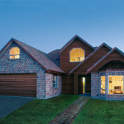 Overall view of a home featuring GreenStuf insulation cottage, elevation, estate, facade, farmhouse, home, house, hut, log cabin, property, real estate, roof, shed, siding, sky, teal