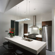 A kitchen featuring an Itailan styled pendant above countertop, interior design, kitchen, product design, gray, white, black