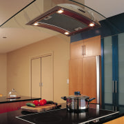 Kitchen with induction cooktop set into black benchtop ceiling, countertop, daylighting, interior design, kitchen, light fixture, lighting, under cabinet lighting, brown, orange