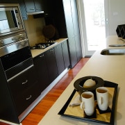 View of the kitchen - View of the countertop, furniture, home appliance, interior design, kitchen, room, black