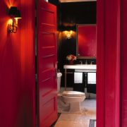 View of the entrance to this bathroom - door, home, house, interior design, light, lighting, red, room, red