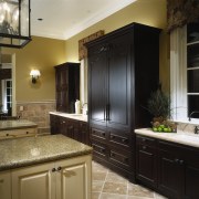 Twin Basins are provided in a single, long, bathroom, cabinetry, countertop, cuisine classique, interior design, kitchen, room, black, brown