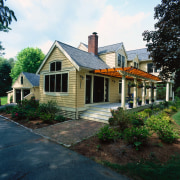 Exterior view of this home with large pergola cottage, estate, facade, farmhouse, historic house, home, house, landscaping, neighbourhood, property, real estate, residential area, roof, siding, suburb, window, yard, black, white