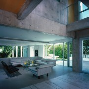 Vie wof the living area, polished concrete and architecture, ceiling, daylighting, estate, floor, house, interior design, black, teal