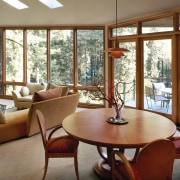 View of the dining area - View of home, house, interior design, living room, real estate, room, table, window, wood, brown, gray