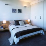 Bedroom with neutral coloured painted walls, and wardrobe bed, bed frame, bedroom, ceiling, floor, home, interior design, property, real estate, room, suite, wall, white