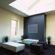 Sitting area with black and white stool seats, architecture, ceiling, daylighting, floor, furniture, interior design, living room, room, table, window, black, white