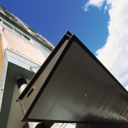 View of underside of aluminium awning, looking upwards architecture, building, daylighting, daytime, facade, house, residential area, roof, sky, black, white