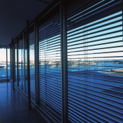 Aluminium louvres at windows, with sliding doors leading architecture, blue, daylighting, facade, glass, interior design, light, lighting, line, shade, sky, structure, window, window blind, window covering, window treatment, black