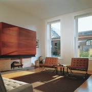 View of the living area - View of architecture, ceiling, floor, flooring, hardwood, home, house, interior design, living room, real estate, room, table, wall, window, wood, wood flooring, gray, brown
