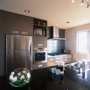 View of the kitchen area - View of countertop, home appliance, interior design, kitchen, room, black, gray